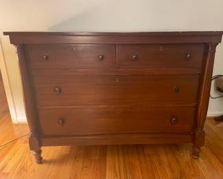 U 44. Empire-style mahogany chest of drawers. (c. 1840-1860) 34.5”h x 48”w x 24”d $175