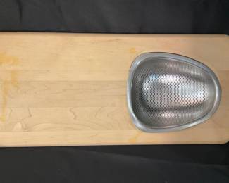 K217. Over sink cutting board with strainer $8