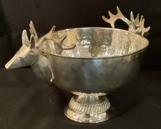 C403. Silver-tone hammered metal bowl with stag head handles, 10” $20