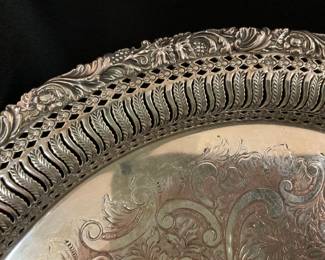 B-126. 15” silver plate round tray $18
