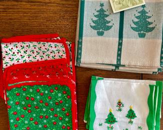 R111. 16 Christmas cocktail napkins and new hand Christmas towels $5