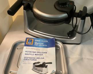 K-255. Kitchen Living Rotating Belgium Waffle Maker; stainless steel. $15