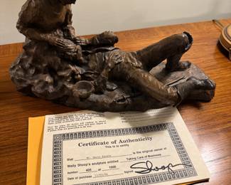 Wally Shoop sculpture " Taking Care of Business"