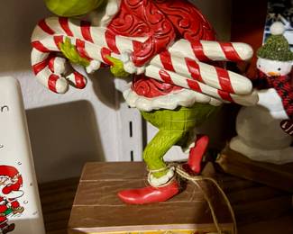 Enesco Grinch Holding Candy Canes Figurine by Jim Shore