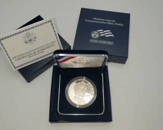 Lot 1127 Abe Lincoln Silver Dollar