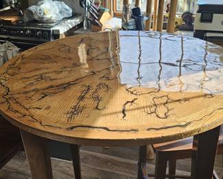 Nice bar type table.  2 Chairs