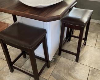 Rolling kitchen island with seating and storage. $350