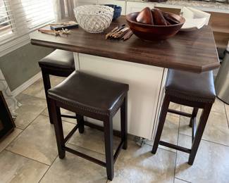Rolling kitchen island with seating and storage. $350