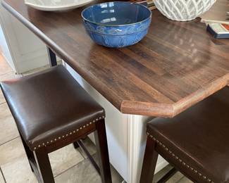 Rolling kitchen island with seating and storage. $350