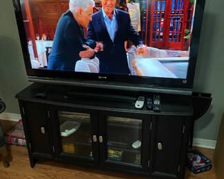 Sony Bravia TV. $250.00.    TV/entertainment cabinet $250. 