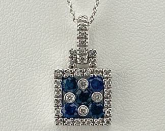 14kt sapphire and diamond necklace/pendant; 16”L chain, pendant has 0.75”drop. Marked 14kt/BH on chain and pendant. Square pendant has 5 round sapphires with 4 bezel set diamonds surrounded by diamond accents