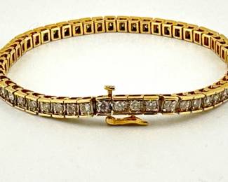 Diamond tennis bracelet in 14kt gold; 53 diamonds, approximately 6.5 carats, 7.5"L, I-SI clarity