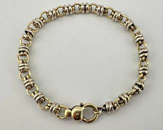 Two tone 14kt double link bracelet; 7.75”L. Marked 585 on clasp. Ring and double link chain bracelet