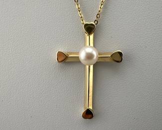 Mikimoto 14kt cross has approx 6mm pearl in center and hangs on 14kt gold chain; 15.75"L