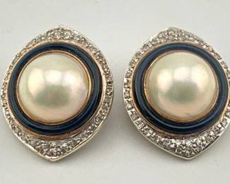 Mabe pearls set in 14kt gold with onyx and diamond surround earrings. Omega clip backs