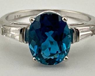 Oval cut blue topaz and clear quartz baguette ring in 14kt white gold size 8.5