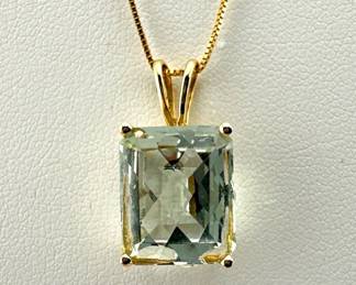 Praisolite pendant set in 14kt gold with delicate box chain; 18"L