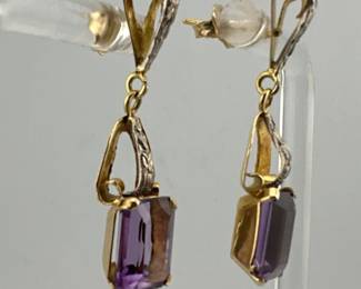Vintage rectangular cut amethyst (approx. 7.5mm long) dangle earrings set in 14kt gold.