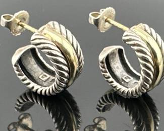 Pair of David Yurman sterling, 14kt huggie hoops. Hoops measure 8mm W x 16mm drop. Marked D.Yurman/925/585. Backs are marked DY/925