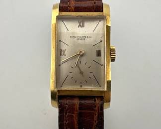 Circa 1935-39 working Patek Philippe 18kt gold tank watch is 18 jewels, RESERVE ITEM