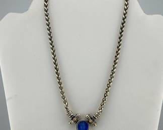 Italian 18kt and sterling heavy necklace with blue intaglio; 17”L. Braided necklace has lobster clasp marked 925/Italy/18kt. Center bezel with etched blue intaglio measures approx. 15mm with two intertwined figures