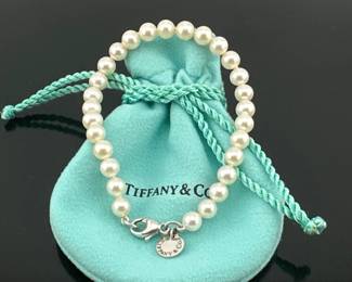 Tiffany and Co. knotted pearl and sterling silver bracelet; 7.25”L. Includes branded Tiffany pouch