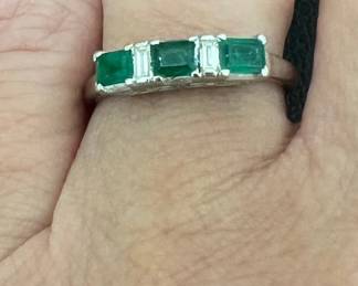 Size 6 Art Deco platinum band has three natural emeralds and two baguette diamonds (VS clarity)