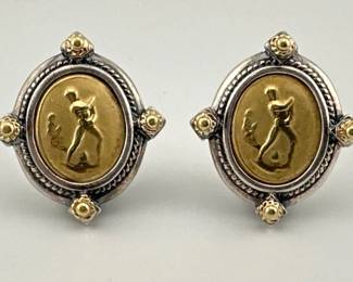 Vintage Italian clip earrings in sterling silver with 18kt gold centers with figural reliefs; approx. 1"H