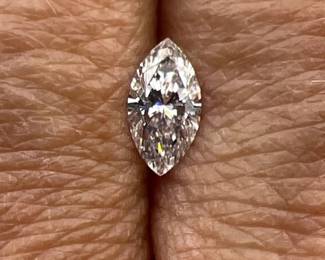 GIA certified loose marquis brilliant cut diamond; 0.57 carats, excellent E color, SI2 clarity. Includes certification.