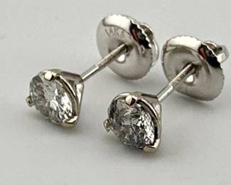 Martini set round cut diamonds (.80 carats, G-I color, VS2-I1 clarity) set in 14kt white gold