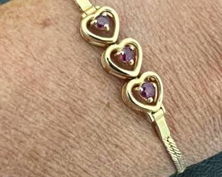 Ruby and 14kt heart bracelet; 7”L