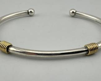 Tiffany and Co. 18kt gold coil and sterling silver bangle, signed and marked 925/750; 2.25"Diam