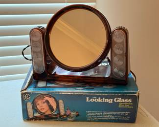 Looking Glass = makeup mirror