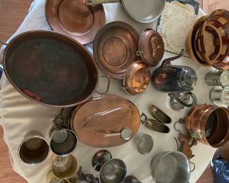 Coppers, metal and wooden bowl table