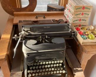 Antique typewriter in storage cabinet