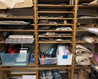 Custom art supplies storage with pull out shelving.  Very nice