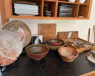 Tons and tons of local hand thrown pottery pieces, some pieces made in California