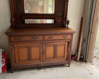 Antique Eastlake Victorian walnut sideboard or buffet with a mirrored back