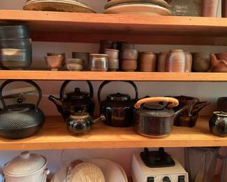 Large collection of Japanese and hand crafted tea pots with large variety of tea cups