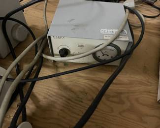  E. Leitz 050260 Illumination Transformer. It is designed to provide an adjustable power supply, typically for a microscope illuminator