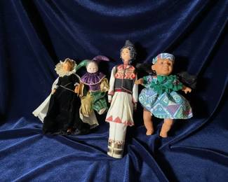 Set of Four Vintage Souvenir Dolls 0 hero