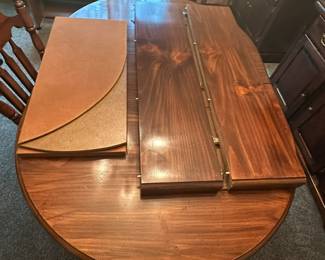 Round Pedestal Dining Table with Leaf Extensions and Matching Chairs 2 hero
