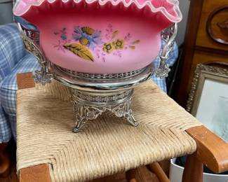 Vintage "ceramic bridal basket" on silver plate stand