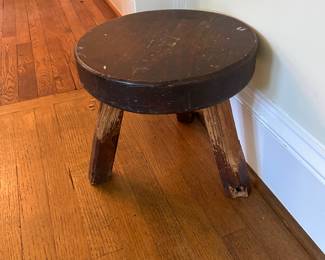 Antique milking stool.