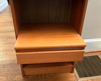 A pair of these stylish bedside tables.