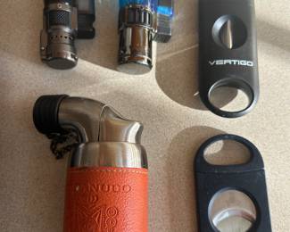 Cigar lighter and cutters.