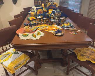 19th century table with 12 chairs, sunflower Talavera, carved wooden decor