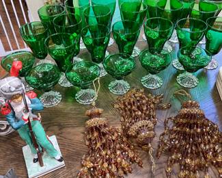Soldier figurine; set of vintage anchor hocking green stemware with clear base in excellent condition