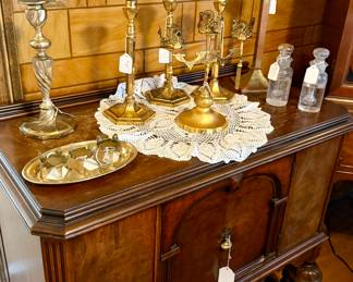 Mahogany Sideboard with brass candlesticks and Holy Water