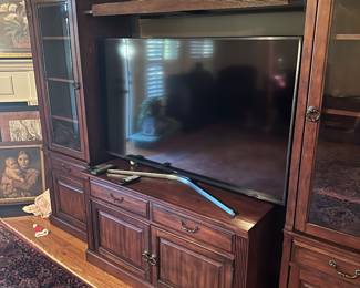 Beautiful entertainment center that will fit your TV, stereo equipment, and media!